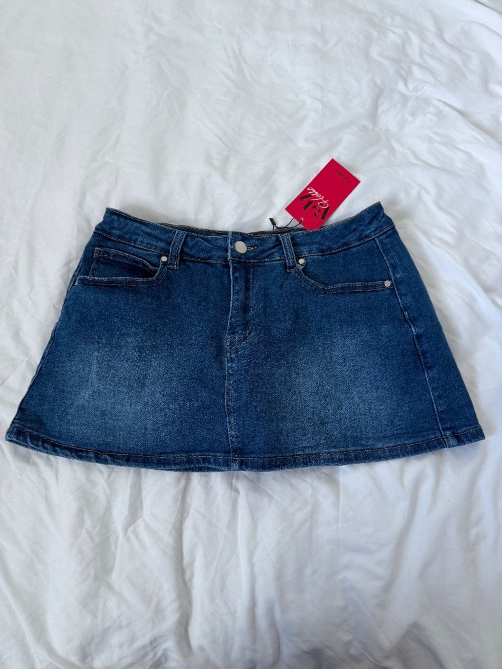 mini denim skirt   size 6   details: -NWT -built in shorts  -stretchy